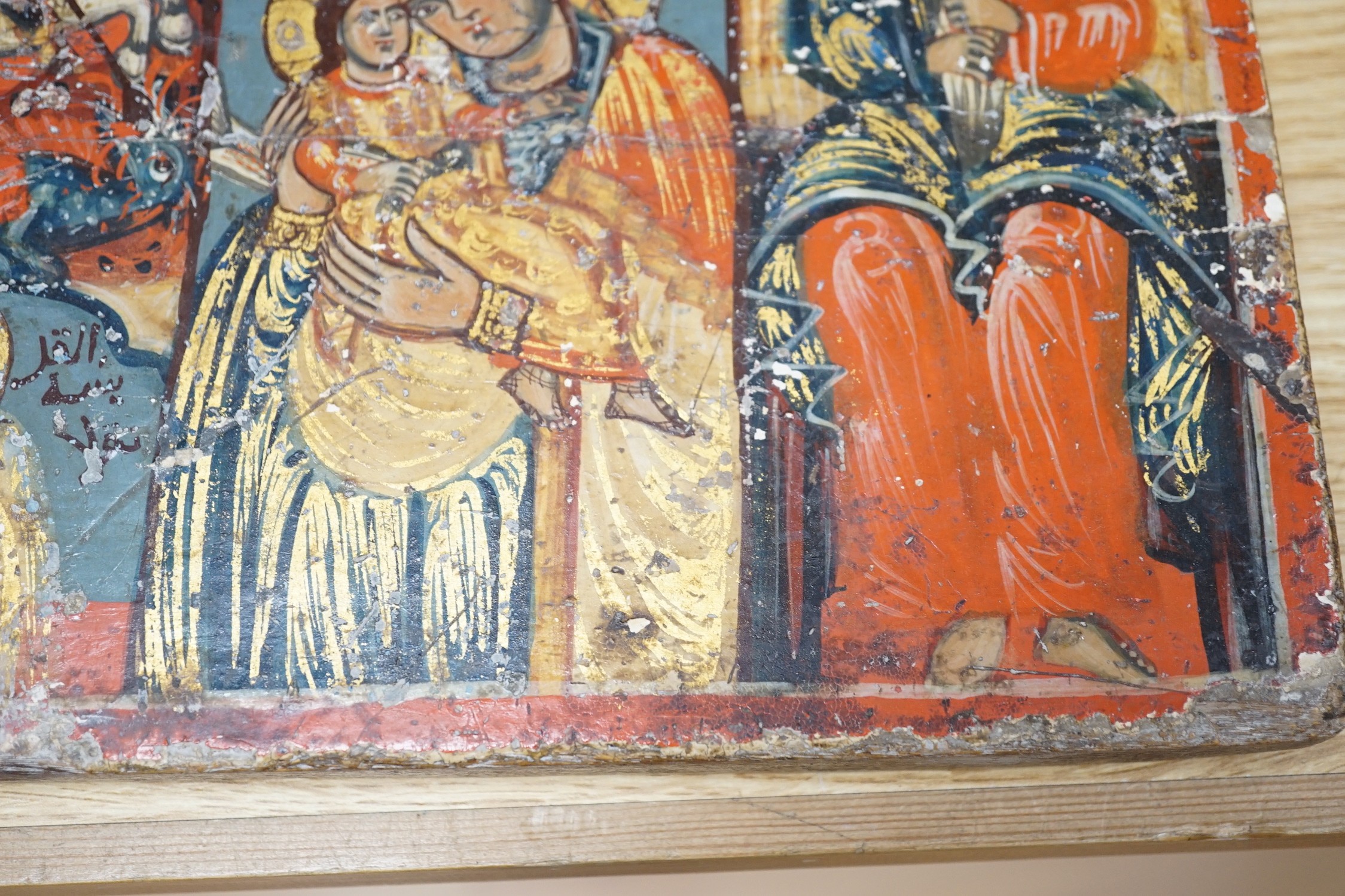 Two polychrome icons, largest 30cms high